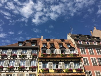 house-half-timbering.jpg Traditional half-timbered houses and blue sky