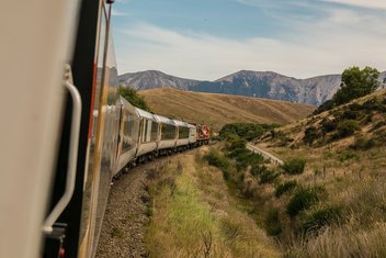train-landscape.jpg A passenger train rolls through a mountainous landscape