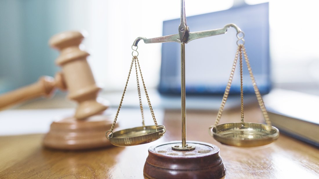 justice-scale.jpg Close-up on a scale and a hammer of justice.