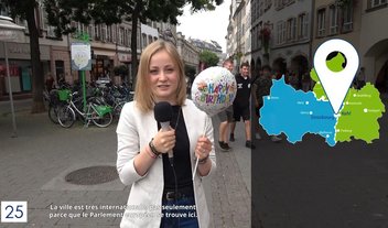Miniature-25years-video.jpg A woman with a microphone during a report on the 25th anniversary of the European Consumer Centre.